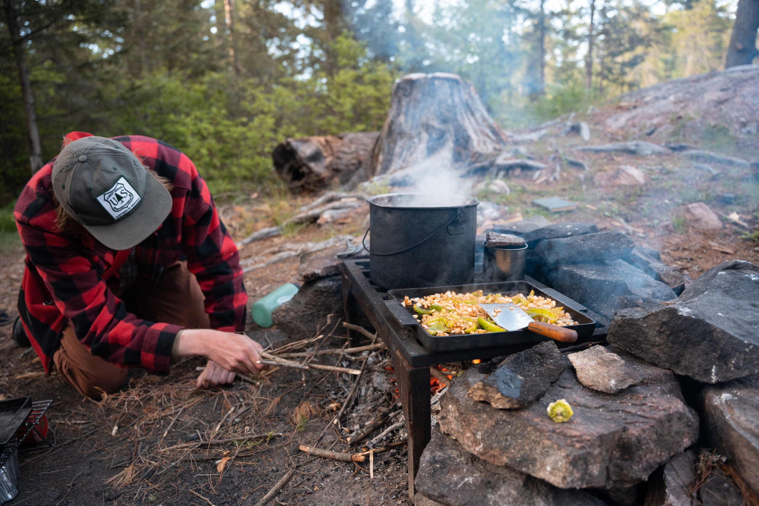 Cooking Vegetables On A Griddle Over A Fire; Fire Grate; Stock Pot